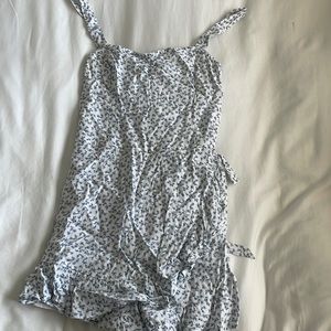 White romper with blue flowers